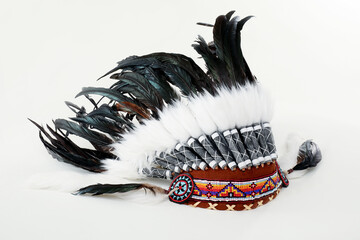 Traditional warbonnet (Native American chief headdress) isolated on white