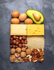 Keto foods eggs, avocado, cheese, seeds, and assorted nuts