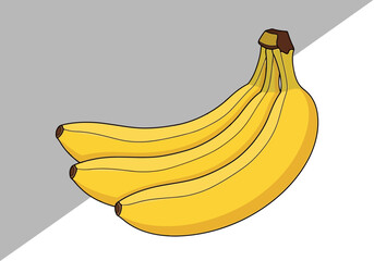 Bunch of ripe yellow bananas on a grey and