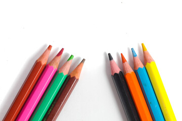 a set of colorful pencils isolated on a white background