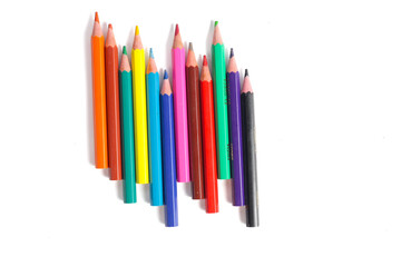a set of colorful pencils isolated on a white background