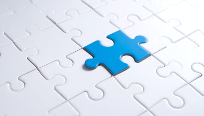 Solution and teamwork concept with blue puzzle piece fitting into final spot on board.