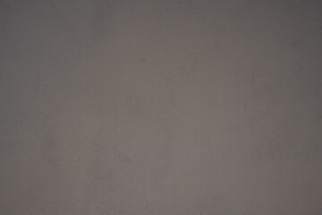 A grey wall with a grey background