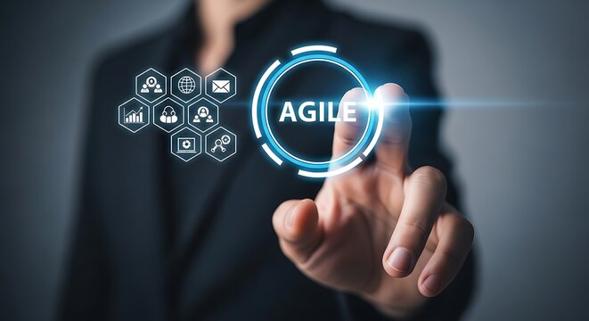 Hand touching a glowing circle with AGILE text and business icons agile management