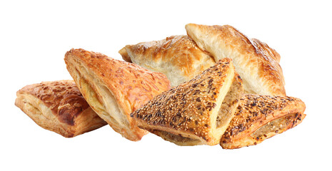 assortment of savory and sweet puff pastries with various toppings