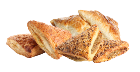 assortment of savory and sweet puff pastries with various toppings