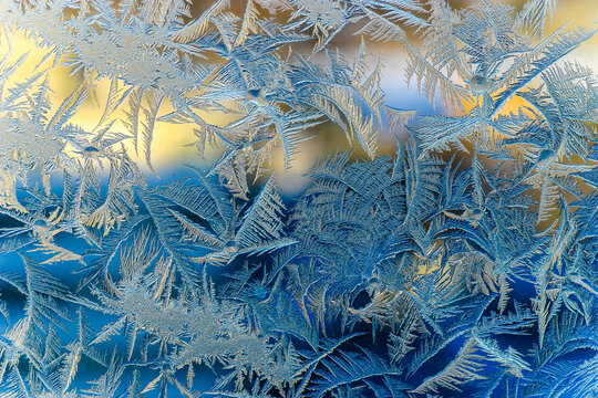 crystalline frost pattern on a window - Powered by Adobe