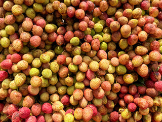 A bunch of limes are piled on top of each other