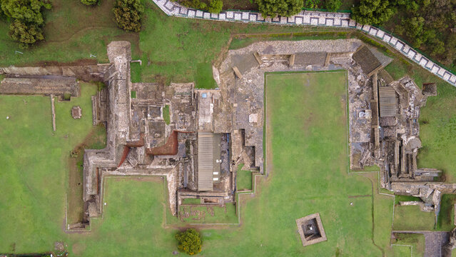 Aerial view of Cholula&rsquo;s ancient ruins beside the Great Pyramid, temples and patios visible. Scenic archaeological landscape, history, cultural heritage, monumental prehispanic architecture