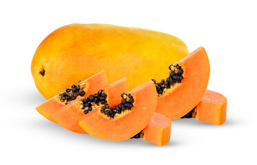 whole ripe papaya accompanied by fresh wedges and small cubes of tropical fruit