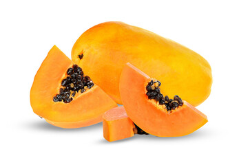 bright whole papaya with fresh slices and a cube of juicy fruit