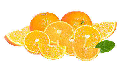 arrangement of fresh oranges, whole and sliced, with green leaf on a dark background