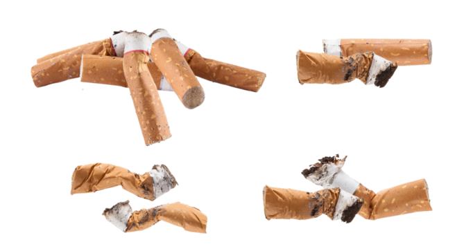 collection of dirty and discarded cigarette butts representing pollution and smoking addiction