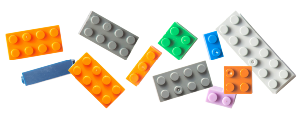 vibrant collection of plastic building blocks in assorted colors on a transparent background