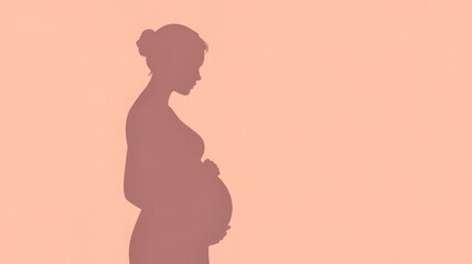 Silhouette of a pregnant woman isolated on a peach background, representing motherhood, expectation, and new life