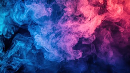 Blue and pink smoke against a black background. The abstract concept of color and texture. The image emphasizes the contrast and movement of the smoke.