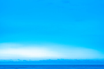 Panorama of cloud clear sky background for summer vacation concept at ocean and summer sea water with sunlight of beautiful cloudy	

