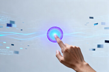 A hand interacts with a glowing circular interface on a digital screen, surrounded by abstract data elements.