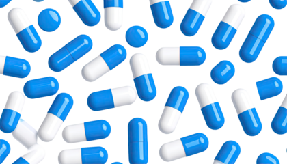 Scattered blue and white medicine capsules