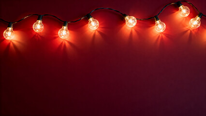 Vintage warm Christmas lights wrapped around a background, creating a festive and nostalgic holiday atmosphere with glowing bulbs