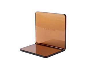 A metallic, amber-toned, compact, book-shaped object