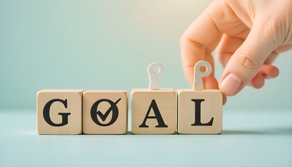 Action plan and goal achievement concept. Wooden blocks displaying icons of targets, check marks and goal completion. Progress tracking, strategic planning and achievement of objectives in business.