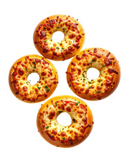 Four mini pizza bagels arranged in a symmetrical pattern.  Melted cheese and red sauce are visible on each bagel