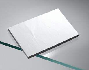 Close-up of a White Rectangular Object Reflecting on Glass Surface