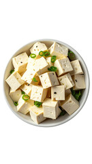 Cubes of light-colored,  cubed cheese in a white bowl.  Fresh green onions sprinkled on top.  High-angle view