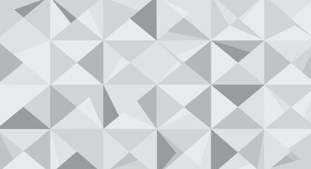 An abstract geometric pattern composed of repeating triangles and quadrilaterals in various shades of gray creating a modern and minimalist design aesthetic.