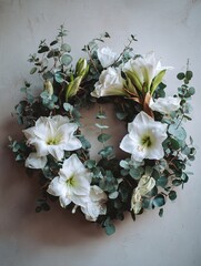 Elegant white amaryllis and fresh green eucalyptus leaves garland hanging on a plain neutral wall, minimalist holiday decoration concept, creating a peaceful and tranquil atmosphere