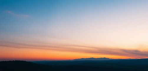 Subtle color shift from deep blue at zenith to lighter hue at horizon,  cloudless,  autumn