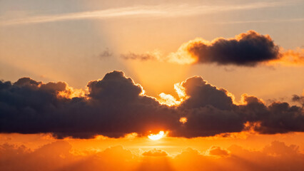 Fototapeta premium Sunset with clouds and sun rays