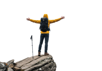 Hiker in Yellow Jacket Standing on Rocky Cliff with Arms Outstretched in Isolated Landscape on White Background