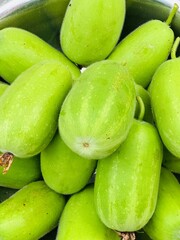 Fresh green bottle gourd vegetables close up