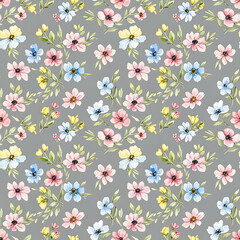 Watercolor floral and leaf pattern of hand-painted wildflowers and sprawling leaves,created for wallpaper and fabric, illuminated with diffused
