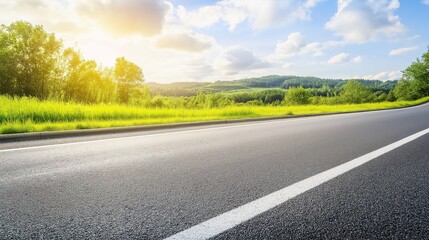Fototapeta premium asphalt. Panoramic view of an empty road under cloudy skies, capturing a serene and open landscape. travel magazines, destination branding, designed for outdoor magazines and nature guides.
