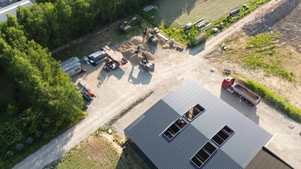Aerial view of construction area and trucks
