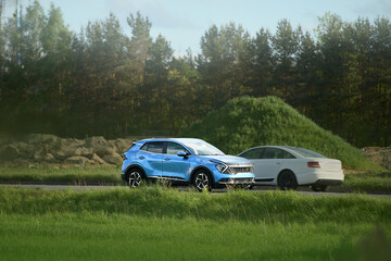 Energy efficient SUV traveling through rural area