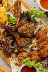 Caucasian barbecue table with grilled vegetables and spices