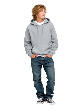 Chill urban portrait of casual young adult leaning against an invisible wall, isolated on transparent background