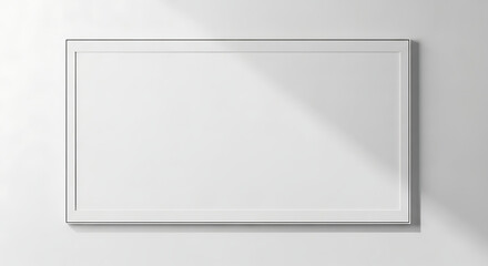 Minimalist White Frame Mockup on a Clean Wall with Natural Shadows