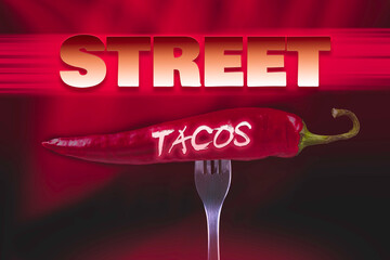 Hot chili peppers on fork. Extra spicy. Mexican food with pepper. Seasonings and spices. Hellish...