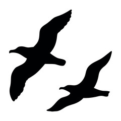 Silhouettes of two seagulls in flight against a white background