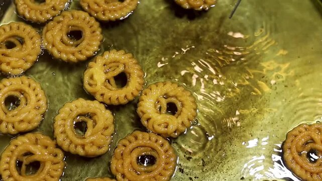 Imarti or Amriti is a sweet from India. It is made by deep-frying vigna mungo flour batter in a circular flower shape, then soaking in sugar syrup.