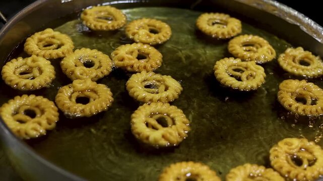 Imarti or Amriti is a sweet from India. It is made by deep-frying vigna mungo flour batter in a circular flower shape, then soaking in sugar syrup.