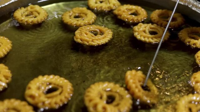 Imarti or Amriti is a sweet from India. It is made by deep-frying vigna mungo flour batter in a circular flower shape, then soaking in sugar syrup.