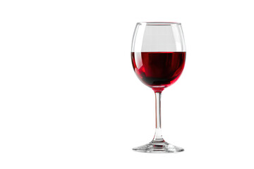 A glass of red wine is sitting on a table. The wine is almost gone, and the glass is almost empty. The wine is a deep red color, and the glass is clear. Concept of relaxation and enjoyment