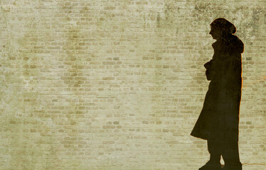 Refugee in Ukraine and Gaza and in the world showed as shadows on a wall with barbed wire