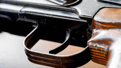 Kalashnikov assault rifle or carbine on a wooden table